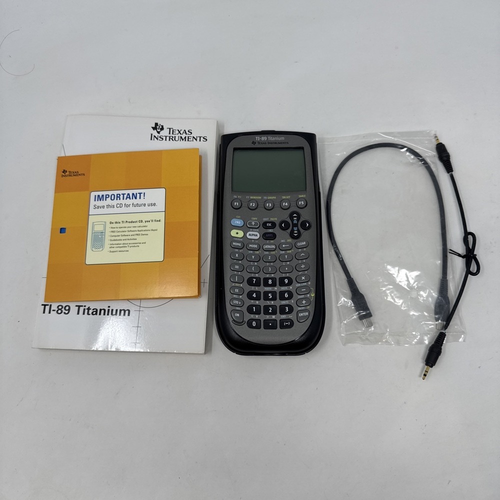 Texas Instruments TI-89 Titanium Graphing Calculator Complete W Cables / Booklet